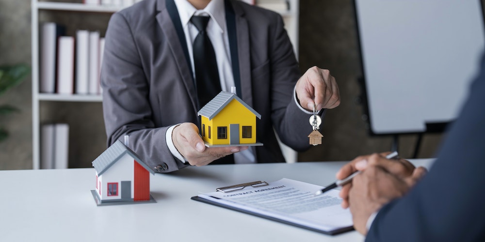 Comprendre le Contrat d'Achat Immobilier : Une Analyse Juridique